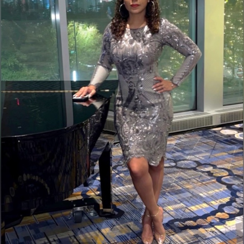 Betsy Adam- Dare to sparkle in this sequined Betsy and Adam dress!